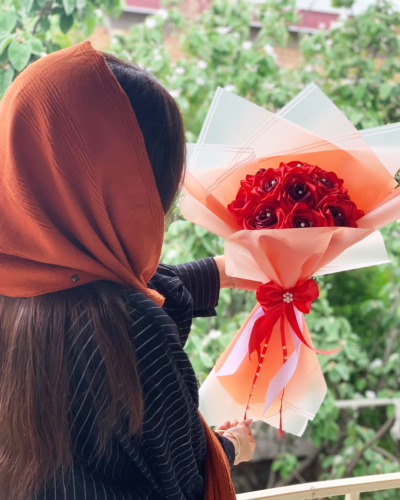 red ribbon flowers bouquet