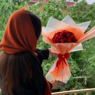 red ribbon flowers bouquet